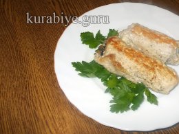 Крученики зі свинини з грибами у духовці