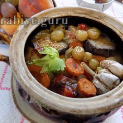 Сом  тушкований з овочами