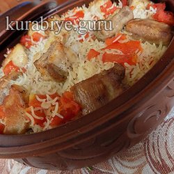 Тушкована свинина «Герцоговина» з рисом і овочами